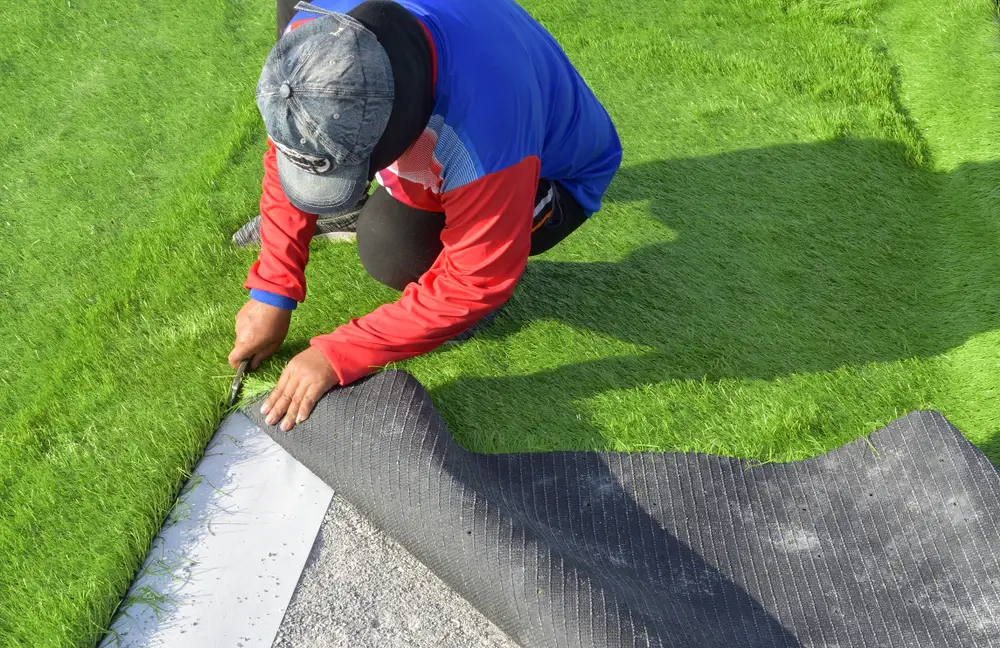 Damaged artificial grass repair.