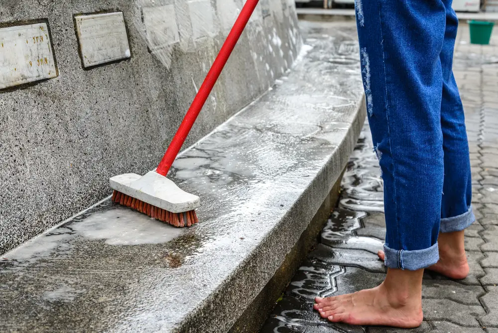 Cleaning unfinished concrete.